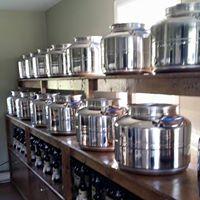 Barrels of Olive Oil at Owner of Olive and Me Interior of the Olive and Me store in Vaudreuil Dorion, Quebec